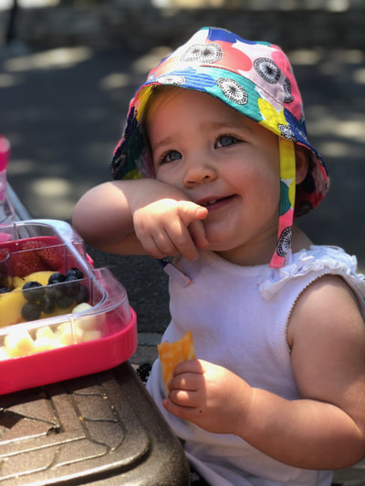 Avery enjoying some snacks at the San Francisco Zoo - summer 2018