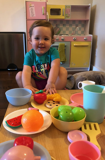Avery got a new kitchen this summer and loves making dinner for everyone with her play food.